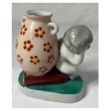 Occupied Japan Porcelain Figurine – Cherub Leaning on Vase with Flowers