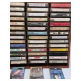Vintage Cassette Tape Collection in Wooden Wall Rack – 1970s-1980s Rock Pop Mix