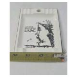 Vintage Humorous Ceramic Ashtray – Lumberjack Hanging from Tree Cartoon