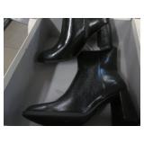 Size 8.5 heeled boots...