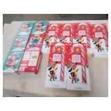 6 Jumbo candy canes and 6 gummy can...