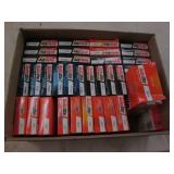 Box of assorted spark plugs...