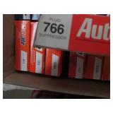 Box of assorted spark plugs...