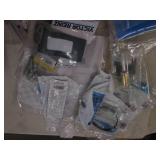 Car parts, spark plugs and emblems...