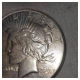 1922 S Peace Dollar $1 VF w/light toning