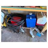 Igloo Cooler - Blue Water Containers - Coiled Hose - Golf Balls - Wooden Crate