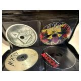 CDs Collection - Eminem, Blink-182, Green Day & More - most sleeves missing CDs that are in Rack