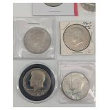 Lot Of 11 Uncirculated Kennedy Half Dollars