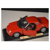 Maisto 2002 Ford Thunderbird Die-Cast Model Car - Red with Display Base