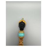 Turquoise Pen With Black Bust Head And Gold Filigree