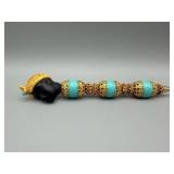 Turquoise Pen With Black Bust Head And Gold Filigree