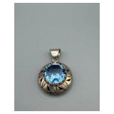 Blue Round Gem Pendant - Silver Halo with Leaf Motif, Bezel Set