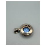 Blue Round Gem Pendant - Silver Halo with Leaf Motif, Bezel Set