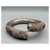 Silver-Tone Hinged Bangle Bracelet with Knurled Bands and Circular Rosette Motifs