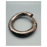 Silver-Tone Hinged Bangle Bracelet with Knurled Bands and Circular Rosette Motifs