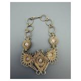 Vintage Silver-Tone Filigree Bracelet with Red Rhinestones