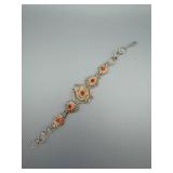 Vintage Silver-Tone Filigree Bracelet with Red Rhinestones