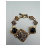 Gold-Tone Bracelet with Black Cabochon Squares & Silver Filigree Center