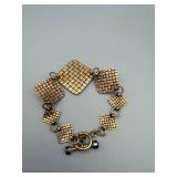Gold-Tone Bracelet with Black Cabochon Squares & Silver Filigree Center