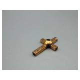 Gold-Tone Cross Pendant with Ornate Scrollwork and Green Stone Accent