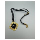 Gold-Tone Square Pendant Necklace With Black Faceted Stone On Braided Cord