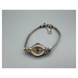 Vintage Silver-Tone Ladies Wristwatch with Ornate Scrollwork
