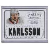 2013-14 Erik Karlsson National Treasures Game Worn Materials #19/99