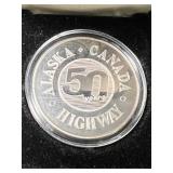 1 TROY OZ .999 FINE SILVER ALASKA HIGHWAY 50TH ANNIVERSARY ROUND IN BOX