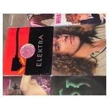 Lot of Vinyl Records Including Wham!, Sheena Easton, and Peter Frampton