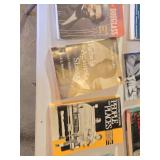 Lot of Books on History, Culture, and Social Issues including "How to Be Black" by Baratunde Thurston, "Deaf in America" by Carol Padden and Tom Humphries, and "Pity the Nation" by Robert Fisk