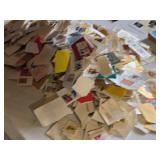 Collection of Vintage and Modern U.S. Postage Stamps Some Unmarked, Pile of Used