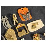 Lot of Assorted Brooches and Pins featuring themes like Operation Desert Storm, sports teams, and novelty designs.