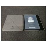 Amazon Kindle Oasis e-reader with a Fintie Origami case