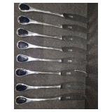 Vintage Fürst Besteck Flatware (Silverware) set in the "Happy Day" pattern, featuring unique dark, rounded handles.