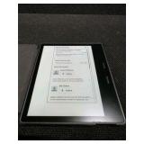 Amazon Kindle Oasis e-reader with a Fintie Origami case