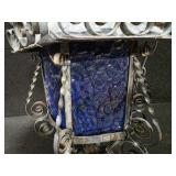 Vintage Hanging Lantern featuring a Decorative Wrought Iron Frame and Textured Blue-Glass Panels