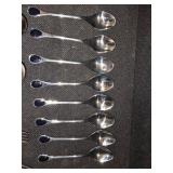 Vintage Fürst Besteck Flatware (Silverware) set in the "Happy Day" pattern, featuring unique dark, rounded handles.