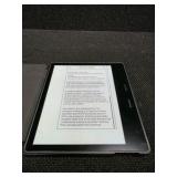 Amazon Kindle Oasis e-reader with a Fintie Origami case