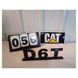 Caterpillar License Plate and Heavy Metal Sign