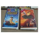 VHSs & DVDs - Lion King, Little Mermaid II, DooWop Gold