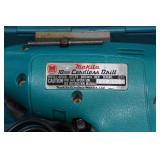 Makita Cordless Drill and Metal Sign