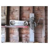 Contents of corner including buckets, a wood barrel, tar paper, motor and more