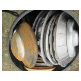 Plastic 55-gallon drum full of vint...