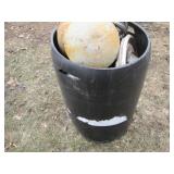 Plastic 55-gallon drum full of vint...