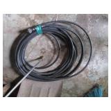 Corner of tools, pressure washer ho...