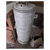 Antique heaters and oil can...