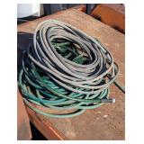 Large Pile of Garden Hoses