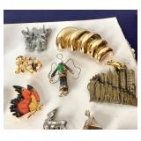 Group of Costume Jewelry: Pins and Rings