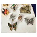 Group of Costume Jewelry: Pins and Rings