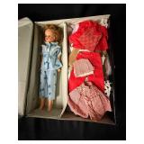 Tammy Fashion Doll with Assorted Vintage Outfits in Black Illustrated Travel Case